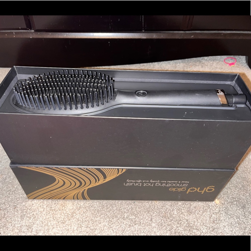 Brand new , never used GHD Glide